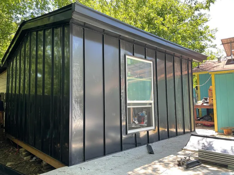 Black standing seam metal wall panels for Roof Inspection in West Haven